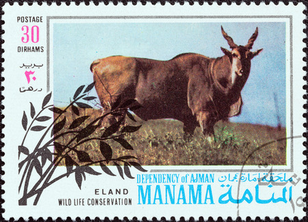 MANAMA DEPENDENCY - CIRCA 1971  A stamp printed in United Arab Emirates from the  Wildlife conservation  issue shows a Common Eland  Taurotragus oryx , circa 1971  のeditorial素材