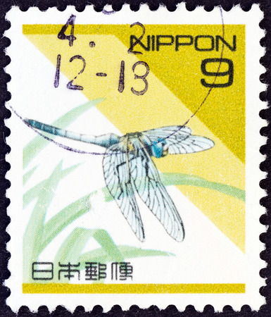 JAPAN - CIRCA 1992  A stamp printed in Japan shows a dragonfly  Orthetrum albistylum , circa 1992  のeditorial素材