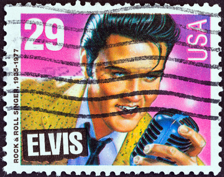 USA - CIRCA 1993  A stamp printed in USA from the  American Music Series  issue shows Elvis Presley  rock   roll singer and actor , circa 1993  のeditorial素材
