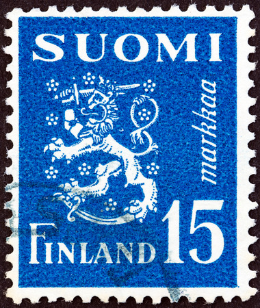 FINLAND - CIRCA 1948: A stamp printed in Finland shows coat of arms, circa 1948. のeditorial素材