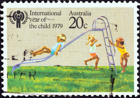 AUSTRALIA - CIRCA 1979: A stamp printed in Australia from the \\\"International Year of the Child\\\" issue shows Children playing on Slide, circa 1979.のeditorial素材