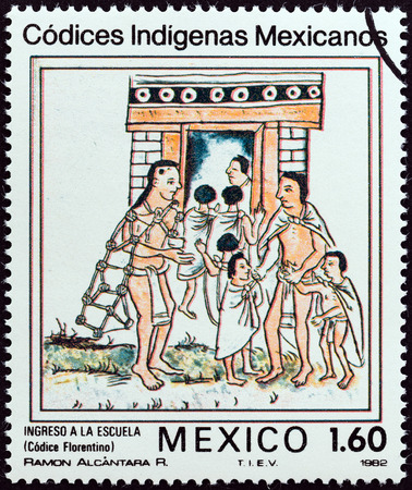 MEXICO - CIRCA 1982: A stamp printed in Mexico from the \"Native Mexican Codices - Florentine Codex \" issue shows Admission to School, circa 1982. のeditorial素材