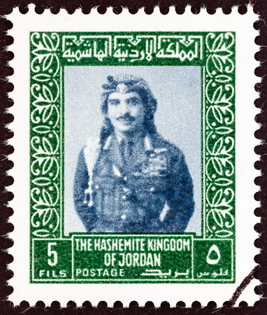 JORDAN - CIRCA 1975: A stamp printed in Jordan shows King Hussein, circa 1975.のeditorial素材