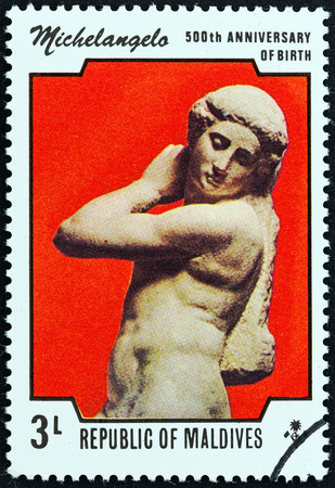 MALDIVES - CIRCA 1975: A stamp printed in Maldives from the \"500th birth anniversary of Michelangelo \" issue shows Apollo, circa 1975.のeditorial素材