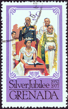 GRENADA - CIRCA 1977: A stamp printed in Grenada issued for the Coronation of Queen Elizabeth II, 25th anniversary shows Coronation, circa 1977.のeditorial素材
