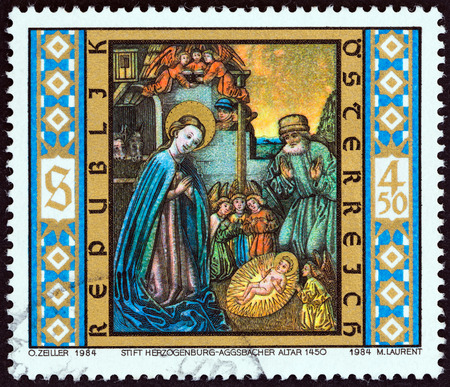 AUSTRIA - CIRCA 1984: A stamp printed in Austria from the "Christmas " issue shows Holy Family (detail, Aggsbach Old High Altar, 1450), circa 1984.のeditorial素材