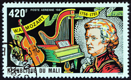 MALI - CIRCA 1981: A stamp printed in Mali from the \"225th Birth anniversary of Mozart \" issue shows Mozart and Musical Instruments, circa 1981.のeditorial素材