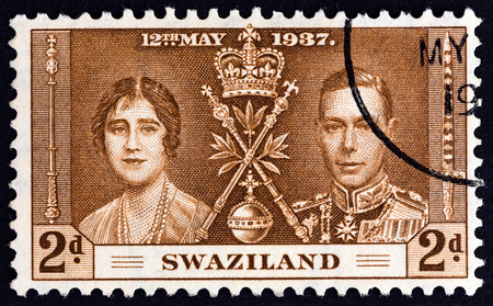 SWAZILAND - CIRCA 1937: A stamp printed in Swaziland from the "Coronation" issue shows King George VI and Queen Elizabeth, circa 1937.のeditorial素材