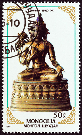 MONGOLIA  CIRCA 1988: A stamp printed in Mongolia from the "Religious Sculptures " issue shows Buddha circa 1988.のeditorial素材