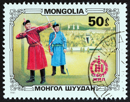 MONGOLIA  CIRCA 1981: A stamp printed in Mongolia from the "Mongolian Sport and Art " issue shows Archers and stadium circa 1981.のeditorial素材