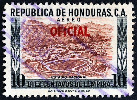 HONDURAS  CIRCA 1956: A stamp printed in Honduras shows National stadium circa 1956.のeditorial素材