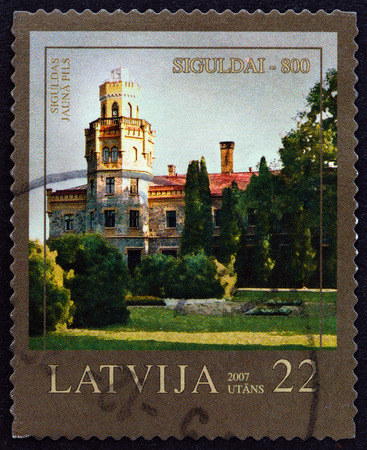 LATVIA  CIRCA 2007: A stamp printed in Latvia from the "800th anniversary of Sigulda " issue shows New Castle circa 2007.のeditorial素材