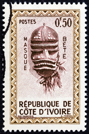 IVORY COAST  CIRCA 1960: A stamp printed in Ivory Coast from the "Native Masks " issue shows Bete Mask circa 1960.のeditorial素材