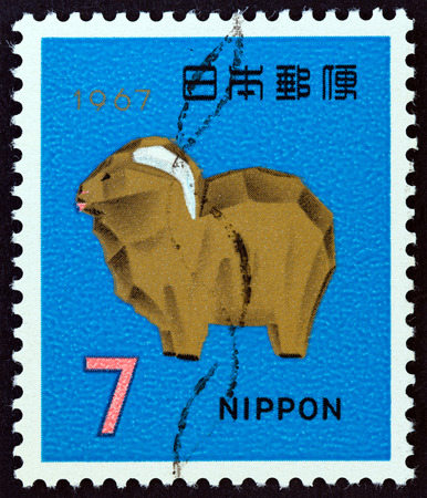 JAPAN - CIRCA 1966: A stamp printed in Japan from the "New Year " issue shows Ittobori Sheep sculpture, circa 1966.のeditorial素材