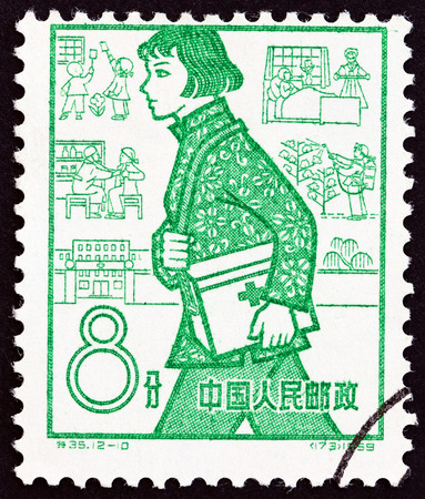 CHINA - CIRCA 1959: A stamp printed in China from the "1st anniversary of Peoples Communes " issue shows Health worker, Public Health, circa 1959.のeditorial素材