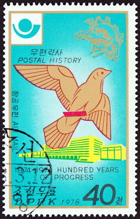 NORTH KOREA - CIRCA 1978: A stamp printed in North Korea from the "Postal Progress " issue shows Dove and U.P.U. headquarters, circa 1978.のeditorial素材