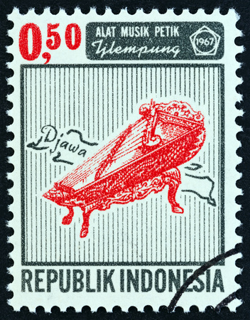 INDONESIA - CIRCA 1967: A stamp printed in Indonesia from the "Musical Instruments " issue shows Tjlempung, circa 1967.のeditorial素材
