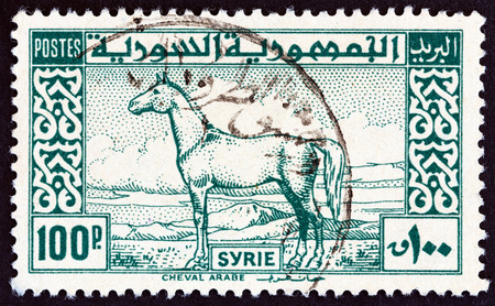 SYRIA - CIRCA 1946: A stamp printed in Syria shows Arab Horse, circa 1946.のeditorial素材