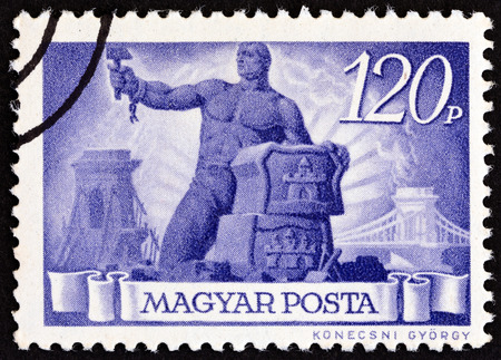 HUNGARY - CIRCA 1945: A stamp printed in Hungary shows Reconstruction, circa 1945.のeditorial素材
