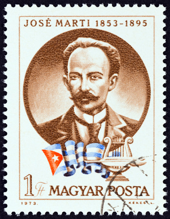 HUNGARY - CIRCA 1973: A stamp printed in Hungary issued for the 120th birth anniversary of Jose Marti shows Cuban patriot Jose Marti, circa 1973.のeditorial素材