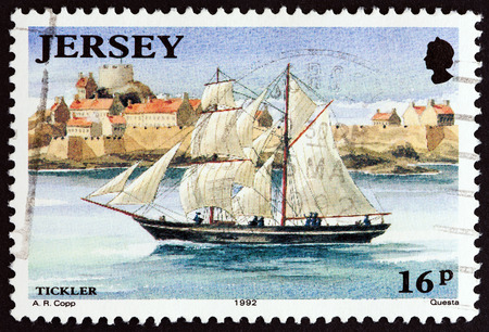 JERSEY - CIRCA 1992: A stamp printed in United Kingdom from the "Jersey Shipbuilding " issue shows Tickler (brigantine), circa 1992.のeditorial素材