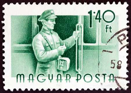 HUNGARY - CIRCA 1955: A stamp printed in Hungary from the "Workers " issue shows  Tram conductor, circa 1955.のeditorial素材