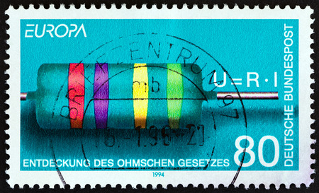 GERMANY - CIRCA 1994: A stamp printed in Germany from the "Europa" issue shows Resistor and Formula (Ohm's Law), circa 1994.のeditorial素材