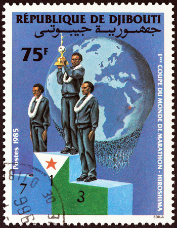 DJIBOUTI - CIRCA 1985: A stamp printed in Djibouti issued for the 1st Marathon World Cup, Hiroshima shows Winners, circa 1985.のeditorial素材