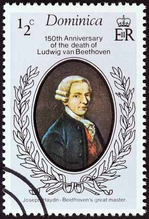 DOMINICA - CIRCA 1977: A stamp printed in Dominica from the "150th death anniversary of Ludwig van Beethoven" issue shows Joseph Haydn, Beethoven's great master, circa 1977.のeditorial素材