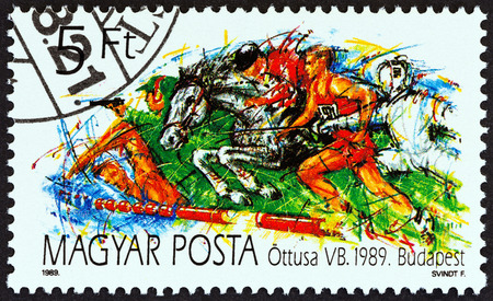 HUNGARY - CIRCA 1989: A stamp printed in Hungary from the "31st World Modern Pentathlon Championships, Budapest" issue shows Competitors, circa 1989.のeditorial素材