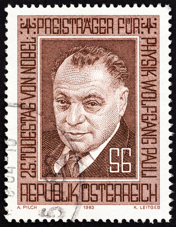 AUSTRIA - CIRCA 1983: A stamp printed in Austria issued for the 25th death anniversary of Wolfgang Pauli shows Nobel Prize winner for Physics Wolfgang Pauli, circa 1983.のeditorial素材