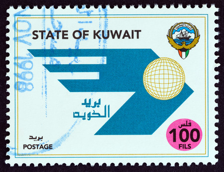 KUWAIT - CIRCA 1998: A stamp printed in Kuwait shows New Postal Emblem, circa 1998.のeditorial素材