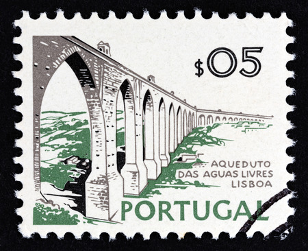 PORTUGAL - CIRCA 1973: A stamp printed in Portugal shows Aguas Livres Aqueduct, Lisbon, circa 1973.のeditorial素材