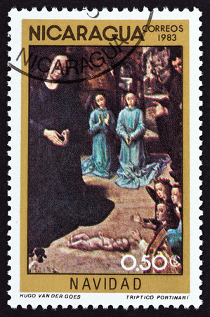 NICARAGUA - CIRCA 1983: A stamp printed in Nicaragua from the Christmas issue shows Adoration of the Shepherds (Hugo van der Goes), circa 1983.のeditorial素材