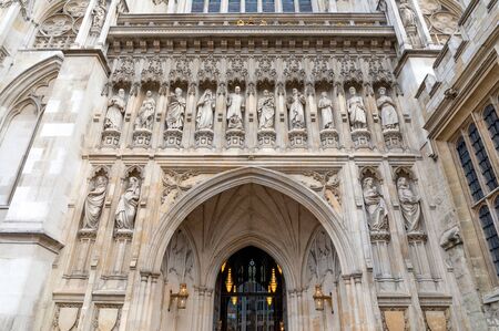 Westminster Abbey's facade with statues, London, UK.の写真素材