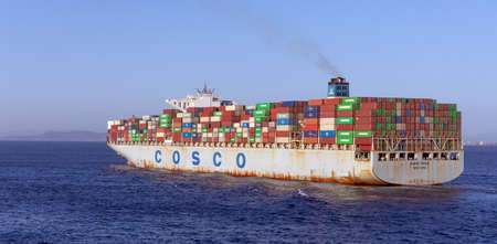 SARONIC GULF, GREECE - JULY 2, 2021: Container Ship COSCO PRIDE in Saronic Gulf on July 2, 2021....