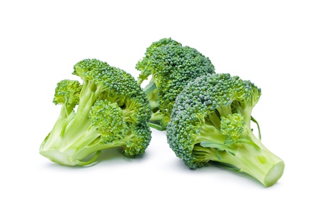 Broccoli. Arrangement of three fresh ripe raw broccoli pieces closeup isolated on white backgroundの写真素材