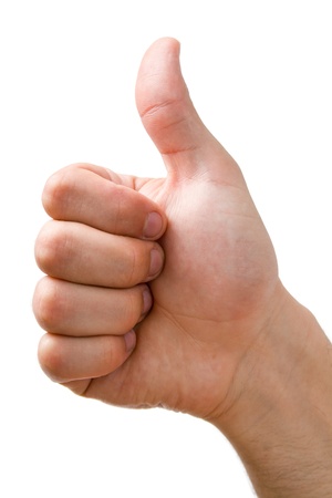 	Hand showing thumbs up sign close-up isolated on white background.の写真素材