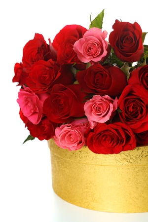 box with bouquet of red roses on white isolated background.の写真素材