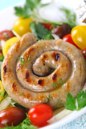 Grilled sausages with salad close upの写真素材