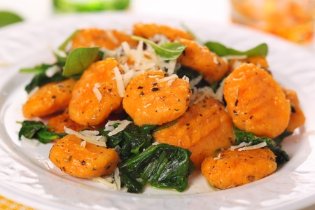 Pumpkin gnocchi with spinach and parmesan cheeseの写真素材
