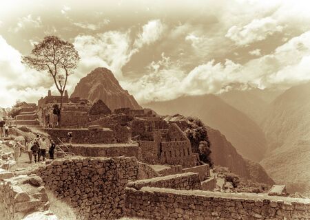 Inca site of Machu Picchu in Peru with Huayna Picchu behind.の写真素材