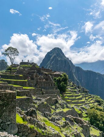 Inca site of Machu Picchu in Peru with Huayna Picchu behind.の写真素材