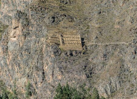 Inca storage houses way up the side of the mountain at Ollantaytambo in the Sacred Valley of Peru.の写真素材