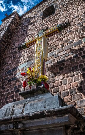 Cross outside of Qoricancha and Santo Domingo in Cusco, Peru.の写真素材