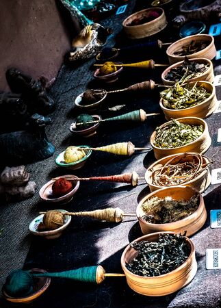Roots and minerals to make colorful textiles at the Awanacancha Textile site in Peru outside of Cusco.の写真素材