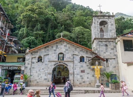 Virgin Del Carmen Spanish church in Aguas Calientes town square in Peru.のeditorial素材