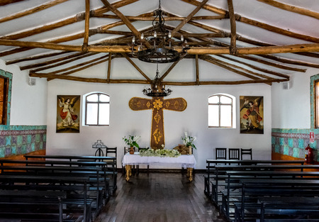 Colorful Spanish church and market place in Yucay, Peru.のeditorial素材