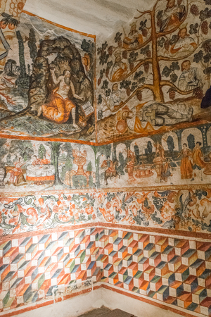 Side chapel with wall 17th century frescoes and Catholic nun mannequins in Santa Catalina Monastery in Cusco, Peru.のeditorial素材
