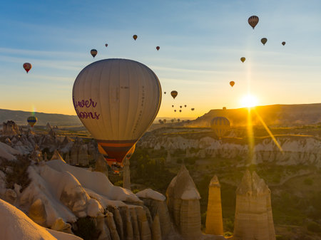 Hot Air Balloons Over Love Valley in Cappadocia, Turkey at Dawn.の写真素材